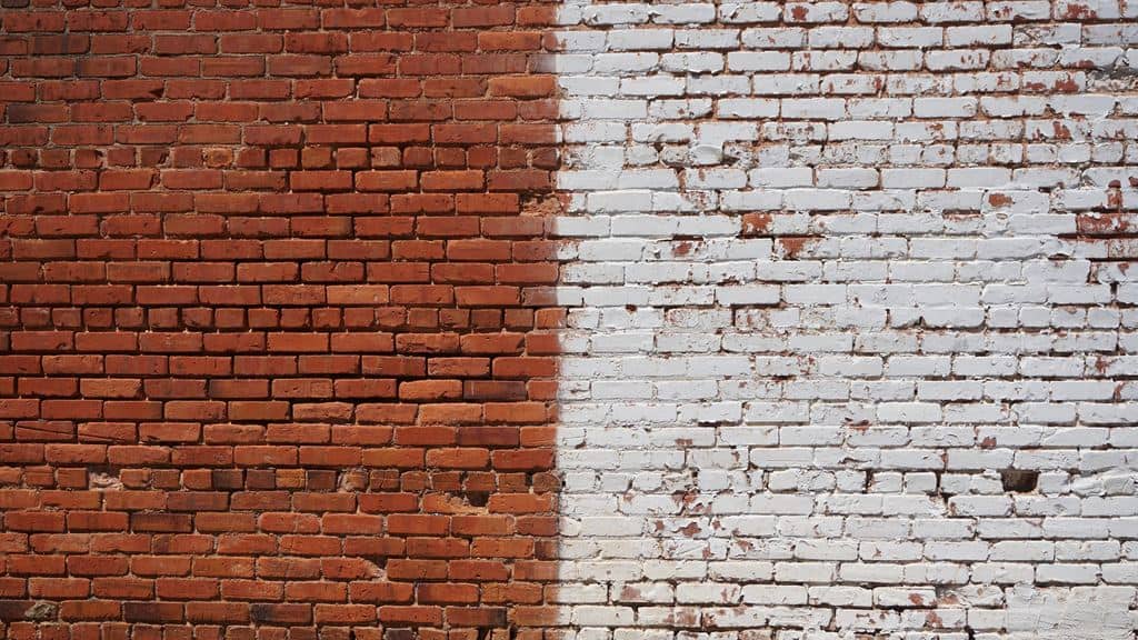 two sides of a brick wall: red and white