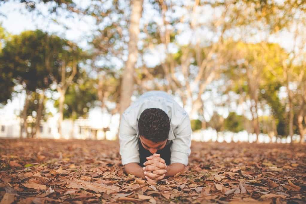 man praying with passion