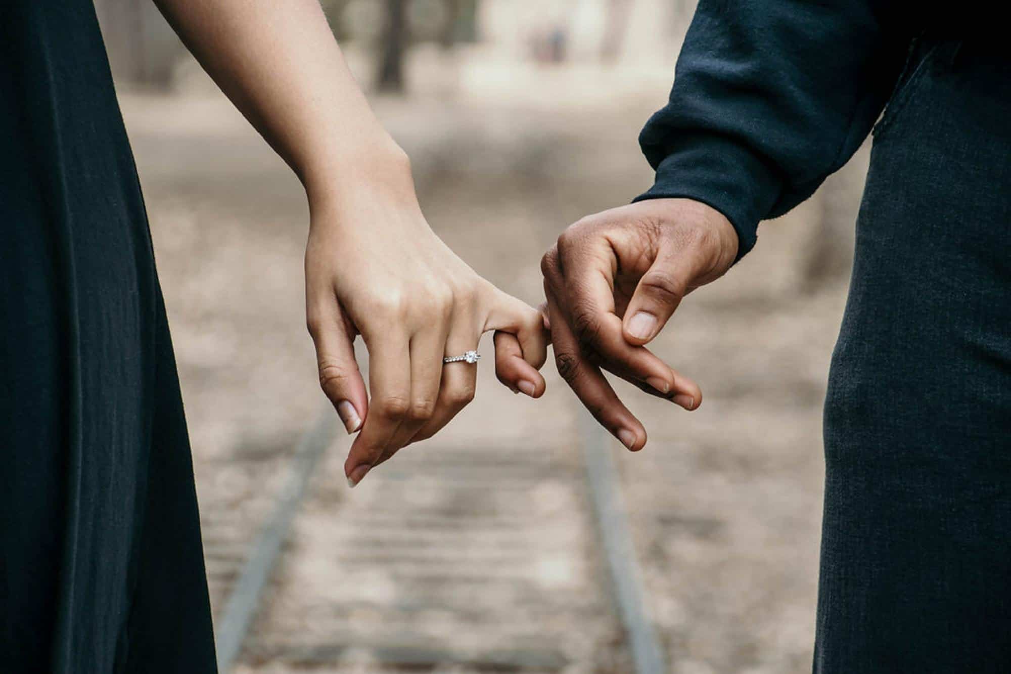 Christian premarital counseling topics man woman holding hands Christian premarital counseling topics