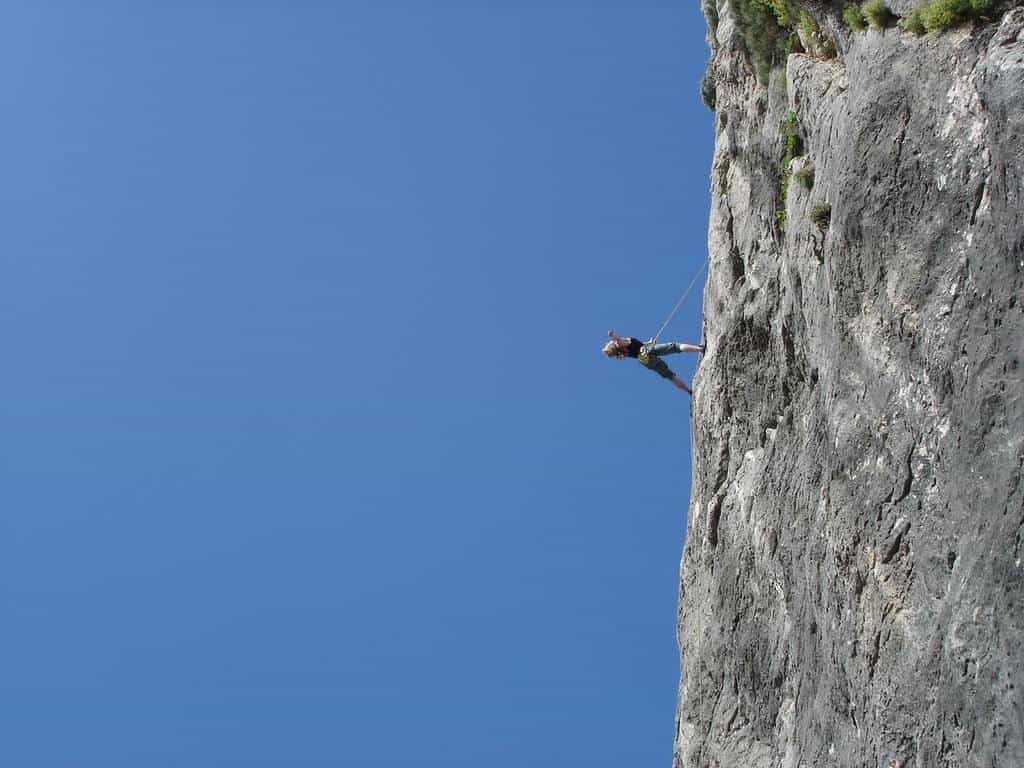man standing on cliff